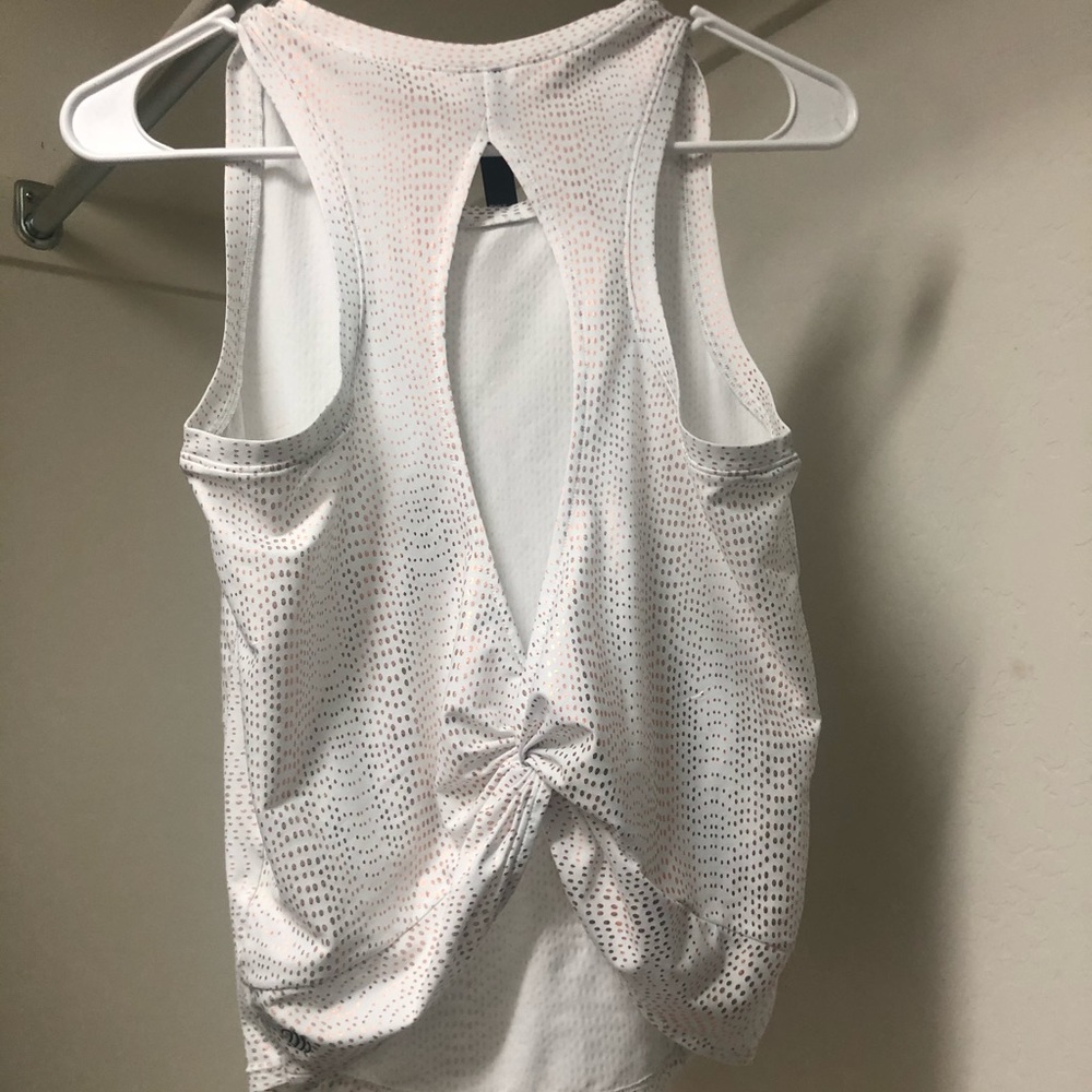 18. MPG sports women’s small athletic tank top with open back.